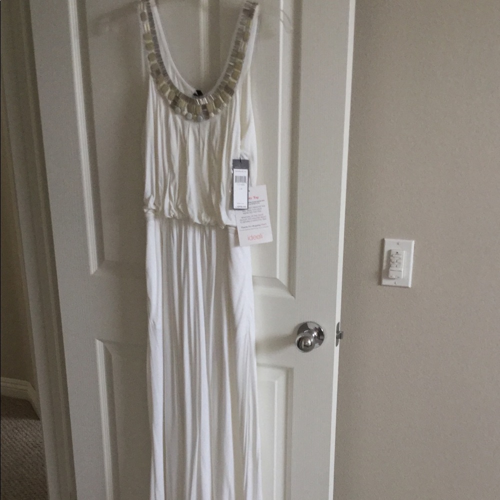 NWT BCBG maxi dress with scoop neck detail.